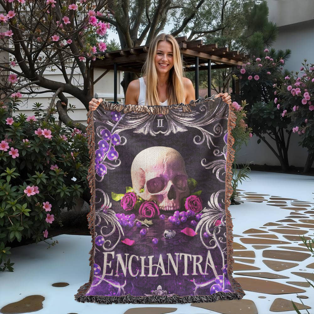 Enchantra Woven Blanket – Official Kaylie Smith Wicked Games Merch held up outside