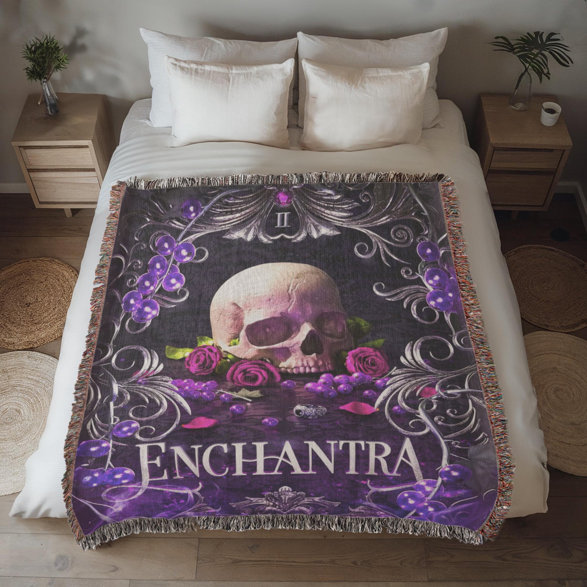 Enchantra Woven Blanket – Official Kaylie Smith Wicked Games Merch on a bed