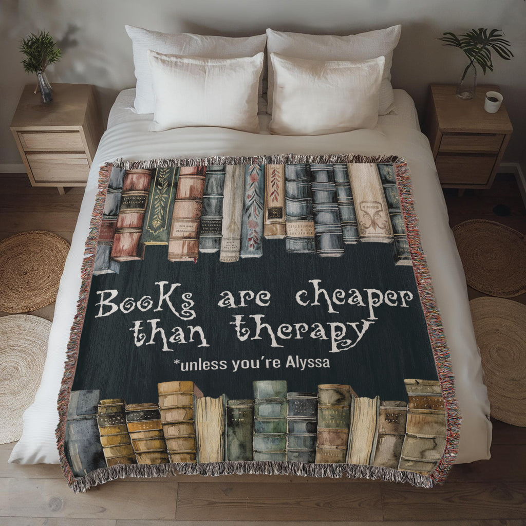 Personalized "Books Are Cheaper Than Therapy" Woven Blanket on a bed – Gift for Introverted Readers - Offbeat Opulence