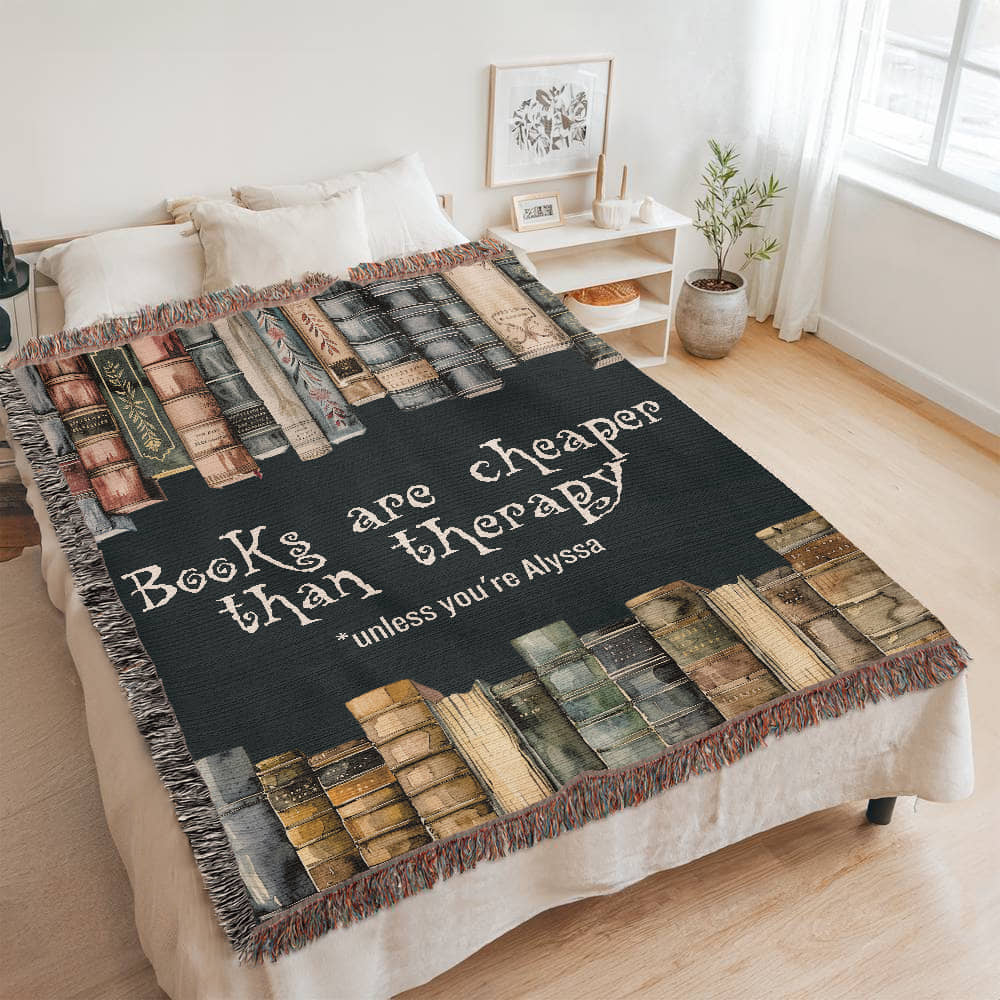 Personalized "Books Are Cheaper Than Therapy" Woven Blanket on a Queen bed – Gift for Introverted Readers - Offbeat Opulence